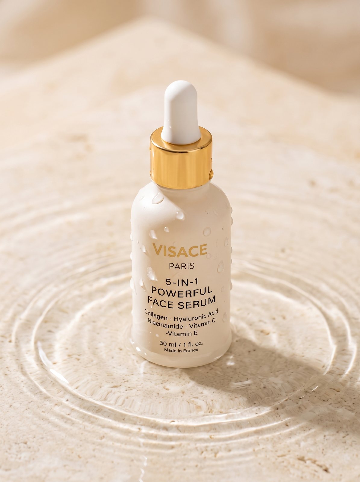 The 5-in-1 Serum standing in rippling water on stone